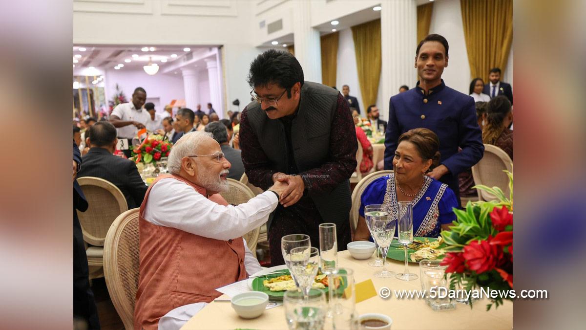 Narendra Modi, Modi, BJP, Bharatiya Janata Party, Prime Minister of India, Prime Minister, Narendra Damodardas Modi, Trinidad and Tobago, Prime Minister of Trinidad and Tobago, Kamla Persad Bissessar, Rana Mohip, Vaishnava Jana